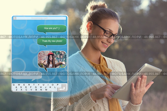 Concept of using wireless technology, video call, typing message on ipad. Incoming call. interface of tablet pc. Стоковое фото, агентство Ingram Publishing / Фотобанк Лори