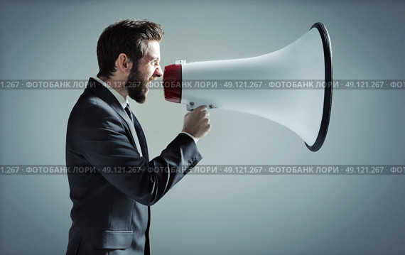 Conceptual photo of manager yelling over the megaphone. Стоковое фото, агентство Ingram Publishing / Фотобанк Лори