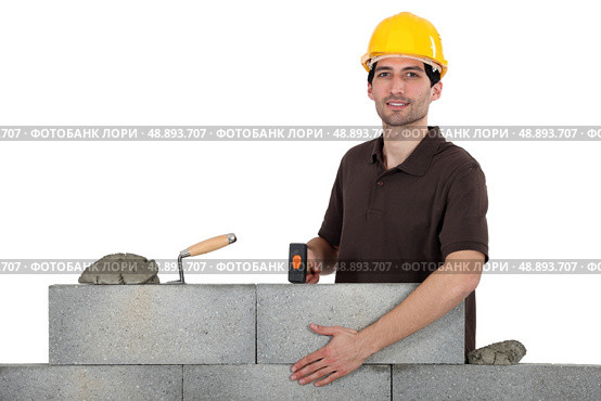 Construction worker at work. Стоковое фото, агентство Ingram Publishing / Фотобанк Лори