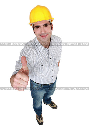 Construction worker giving the thumb’s up. Стоковое фото, агентство Ingram Publishing / Фотобанк Лори