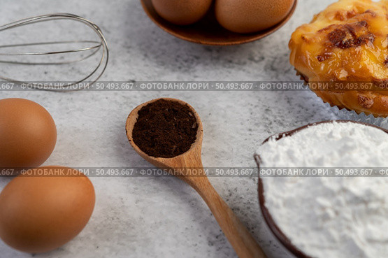 Cooked bread with ingredients Eggs and tapioca flour in a cup. Selective focus. Стоковое фото, агентство Ingram Publishing / Фотобанк Лори