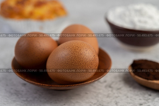 Cooked bread with ingredients Eggs and tapioca flour in a cup. Selective focus. Стоковое фото, агентство Ingram Publishing / Фотобанк Лори