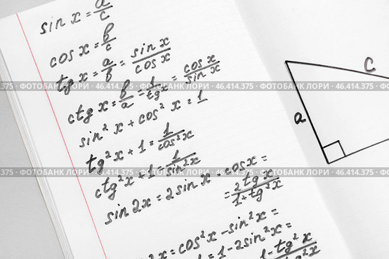 Copybook with maths formulas, closeup. Стоковое фото, фотограф Pixel_shot / Фотобанк Лори