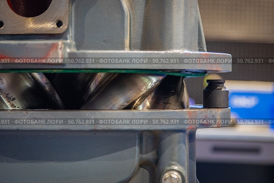 Cross section of a screw compressor showing intermeshing rotors. Стоковое фото, фотограф Юрий Поздников / Фотобанк Лори