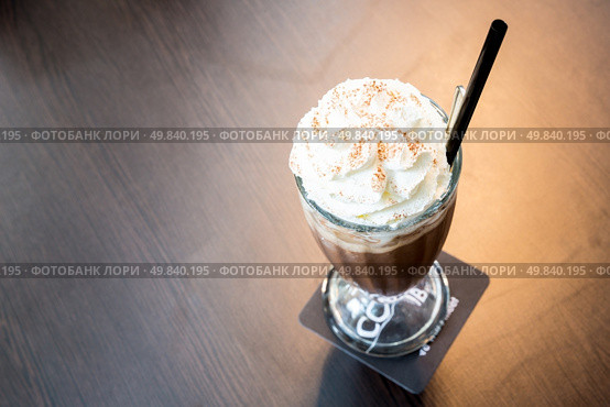 Cup of iced mocha coffee with whipping cream. Стоковое фото, агентство Ingram Publishing / Фотобанк Лори