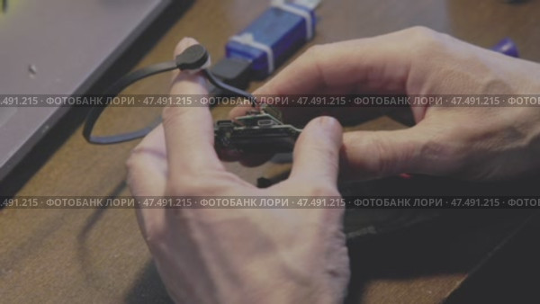 Currently, handson repairs and electronics assembly work is actively in progress as we speak. Стоковое видео, видеограф Olesia Kondrateva / Фотобанк Лори
