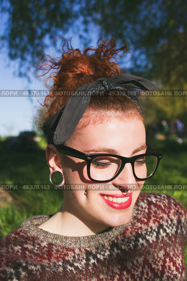 Cute and redhead nerdy girl . Стоковое фото, агентство Ingram Publishing / Фотобанк Лори