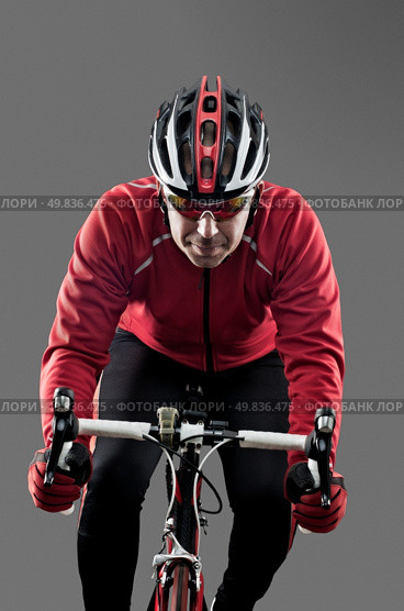 Cyclist on road bike on grey background. Стоковое фото, агентство Ingram Publishing / Фотобанк Лори