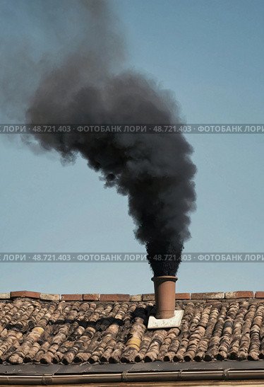 Dark smoke rises ominously from the chimney of the Sistine Chapel, signaling the ongoing papal election. Crowds gather below, anticipating news of the new pope Generative AI. Стоковое AI-изображение, AI-художник Юлия Петровская / Фотобанк Лори
