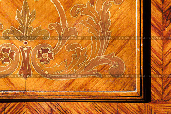 Decorative inlay carving of vintage wooden wall panel. Стоковое фото, фотограф EugeneSergeev / Фотобанк Лори