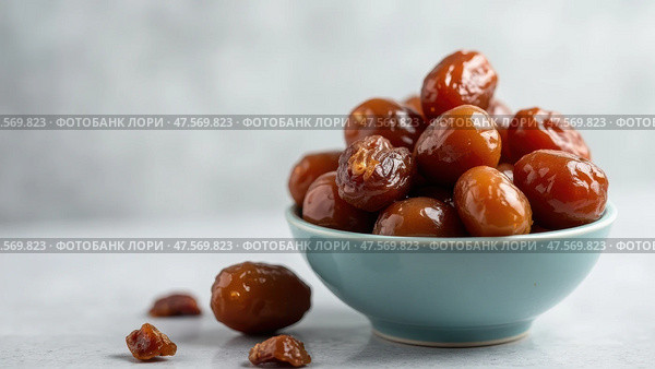 Delicious Arabian Dates Served in a Bowl for Iftar During Ramadan Festivities. Стоковое AI-изображение, AI-художник Sergey Grishin / Фотобанк Лори
