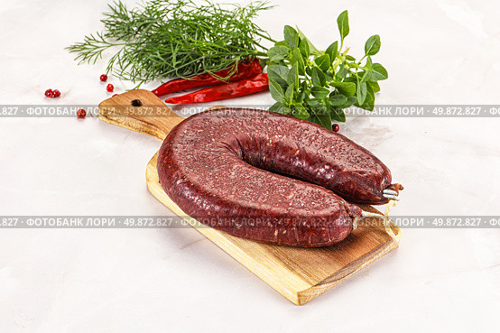 Delicious dry cured beef basturma on table, closeup. Стоковое фото, фотограф Андрей Старостин / Фотобанк Лори