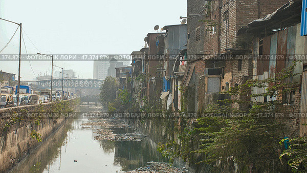 Dharavi slums in east Mumbai. Bandra District, Maharashtra, India. Стоковое фото, фотограф Mikhail Davidovich / Фотобанк Лори