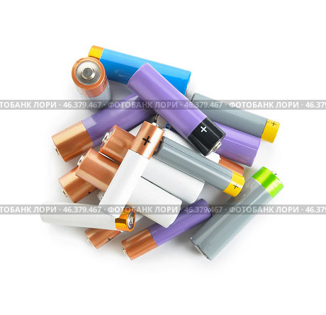 Different alkaline batteries isolated on white background. Стоковое фото, фотограф Pixel_shot / Фотобанк Лори