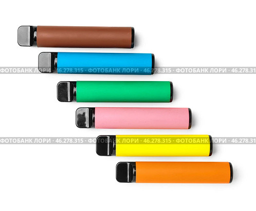 Different disposable electronic cigarettes on white background. Стоковое фото, фотограф Pixel_shot / Фотобанк Лори
