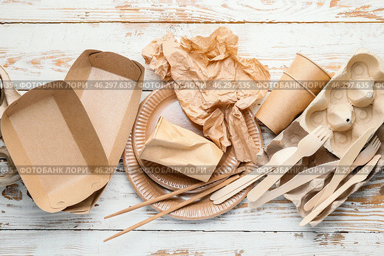 Different garbage on white wooden background. Recycling concept. Стоковое фото, фотограф Pixel_shot / Фотобанк Лори