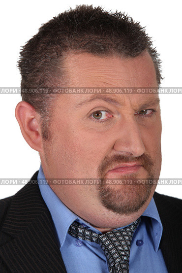 Disdainful businessman raising an eyebrow. Стоковое фото, агентство Ingram Publishing / Фотобанк Лори