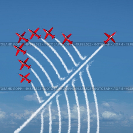 Disruptive innovation Independent leadership concept and individuality as a group of acrobatic jets with one individual jet going in the opposite direction as a business symbol for new thinking and attitude as a different nonconformist maverick. Стоковое фото, агентство Ingram Publishing / Фотобанк Лори