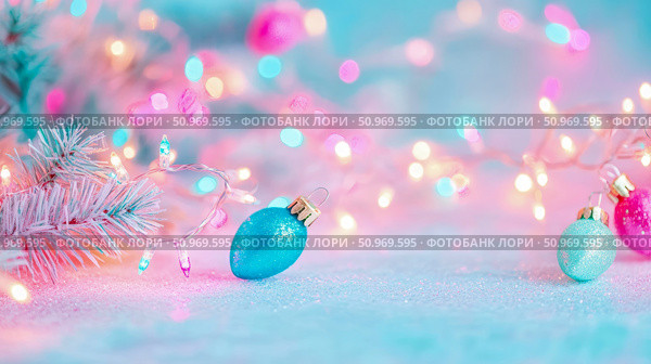 Dreamy pastel pink and blue Christmas holiday decoration with sparkly ornaments, frosted pine branch, and enchanting string lights creating a magical festive ambiance. Стоковое AI-изображение, AI-художник Данила Большаков / Фотобанк Лори