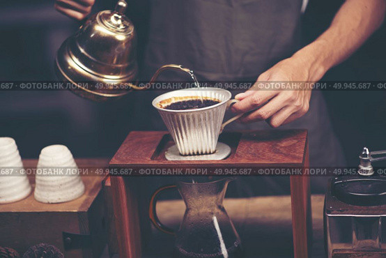 Drip brewing, filtered coffee, or pour-over is a method which involves pouring water over roasted, ground coffee beans contained in a filter. Стоковое фото, агентство Ingram Publishing / Фотобанк Лори