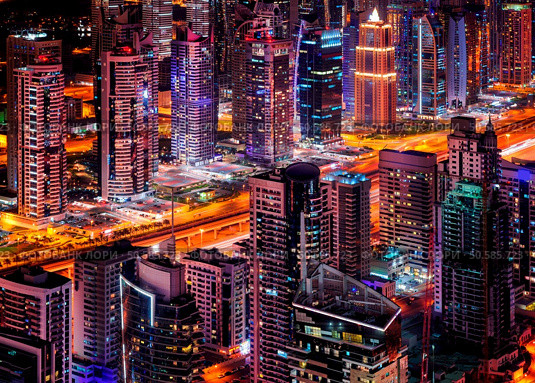 Dubai cityscape at night, view from Burj Khalifa’s 124th floor. Стоковое фото, агентство Ingram Publishing / Фотобанк Лори