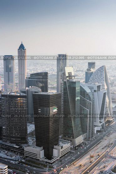 DUBAI, UAE - JAN 9, 2017: One Business Bay, Prism Tower, Regal Tower, Exchange Tower, Iris Bay tower. Редакционное фото, фотограф Losevsky Pavel / Фотобанк Лори