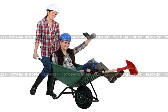 duo of female bricklayers. Стоковое фото, агентство Ingram Publishing / Фотобанк Лори