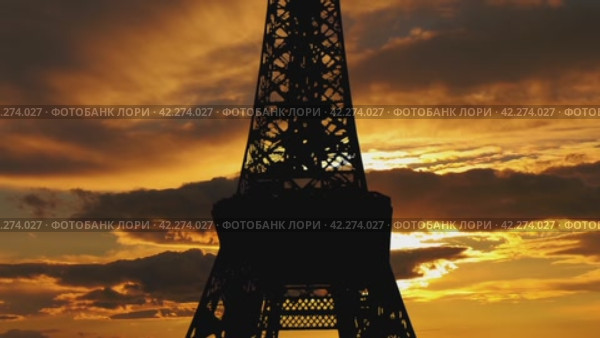 Eiffel Tower in Paris, France (against the background of the sunset, 4K, time lapse, with zoom) (2024 год). Стоковое видео, видеограф Владимир Журавлев / Фотобанк Лори