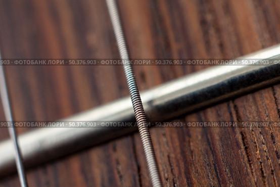electric guitar, close-up, fingerboard, fret and strings. Стоковое фото, агентство Ingram Publishing / Фотобанк Лори