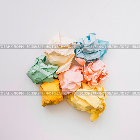 elevated view crumple paper isolated white background. Стоковое фото, агентство Ingram Publishing / Фотобанк Лори