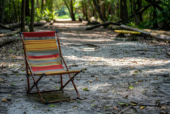Empty colorful chair on a forest pathway. Стоковое AI-изображение, AI-художник Иван Рябоконь / Фотобанк Лори