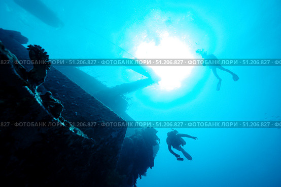 Exploring Deep Blue Mystery of a Sunken Ship in the Red Sea. Стоковое фото, фотограф Aleksandr Golubev / Фотобанк Лори
