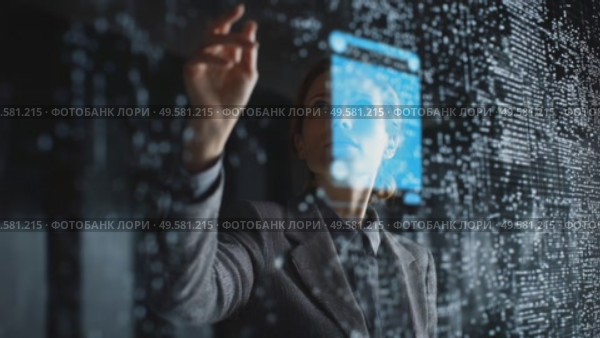 Exploring digital data visualization in a modern office environment with advanced technology. Стоковое AI-видео, аниматор Сергей Толмачёв / Фотобанк Лори