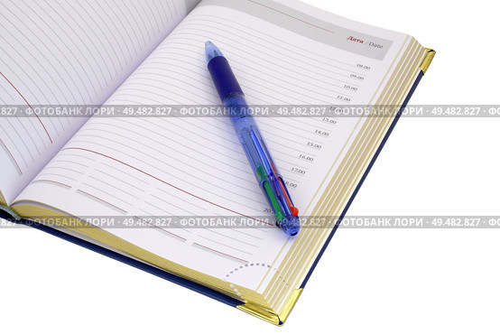 Ежедневник с шариковой ручкой на белом фоне. A diary with a ballpoint pen on a white background. Стоковое фото, фотограф Татьяна Д / Фотобанк Лори