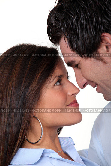 Faces of a couple in love. Стоковое фото, агентство Ingram Publishing / Фотобанк Лори
