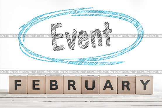 February event sign made of wood on a stage. Стоковое фото, агентство Ingram Publishing / Фотобанк Лори