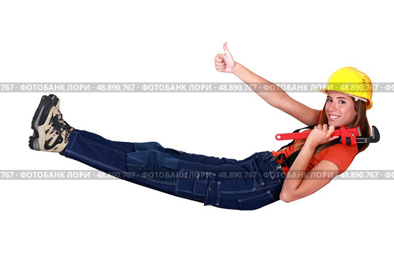 Female construction worker giving a thumbs up. Стоковое фото, агентство Ingram Publishing / Фотобанк Лори