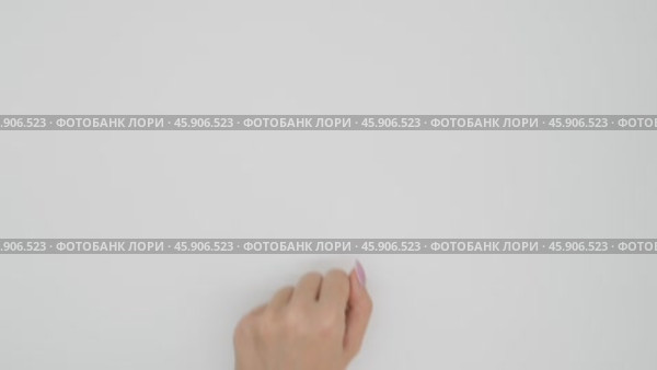 Female hand showing one finger from fist. Hand signs on light background. Стоковое видео, видеограф Катерина Белякина / Фотобанк Лори