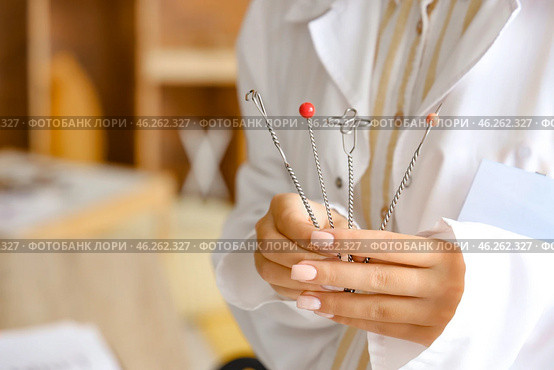 Female speech therapist with logopedic probes in office, closeup. Стоковое фото, фотограф Pixel_shot / Фотобанк Лори
