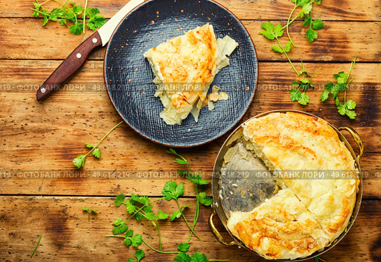 Filo dough pie with cheese and cottage cheese. Homemade pie with cheese and cottage cheese. Стоковое фото, агентство Ingram Publishing / Фотобанк Лори
