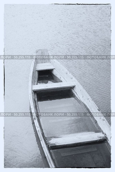 Fine art image in black & white. A wooden boat on a misty lake. Стоковое фото, агентство Ingram Publishing / Фотобанк Лори