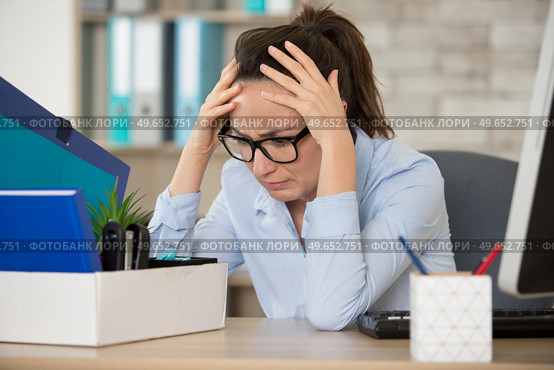 fired young woman feeling helpless. Стоковое фото, агентство Ingram Publishing / Фотобанк Лори