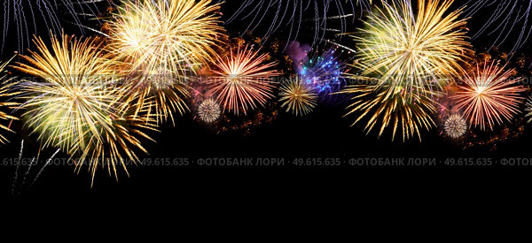 Fireworks colorful explosions on black, festive extra wide web banner background with copy space. Fireworks explosions on black. Стоковое фото, агентство Ingram Publishing / Фотобанк Лори