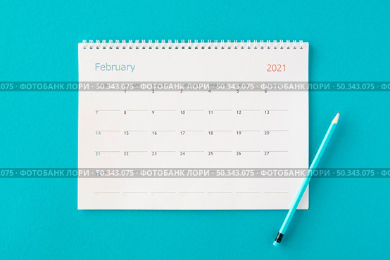 flat lay planner calendar blue background. Стоковое фото, агентство Ingram Publishing / Фотобанк Лори