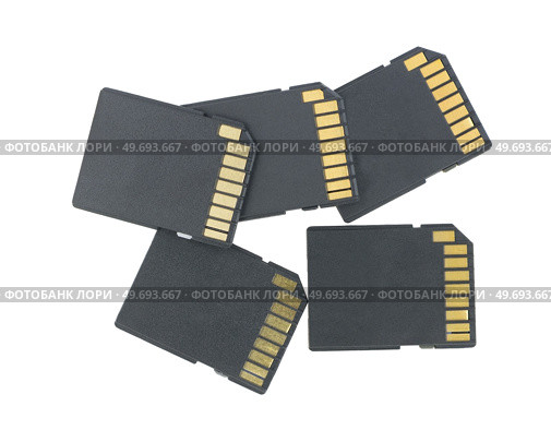 Флеш карты на белом фоне. Stack of SD memory cards isolated on white background. Стоковое фото, фотограф Татьяна Д / Фотобанк Лори