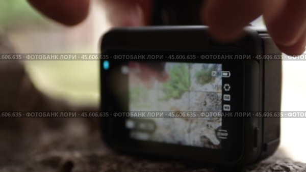 FPV Drone Pilot Adjusting Action Camera with ND Filter. Стоковое видео, видеограф Поскребышев Михаил / Фотобанк Лори