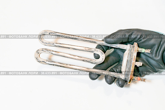 Fragment of the heating element of the washing machine. Стоковое фото, фотограф Siarhei Starastau / Фотобанк Лори