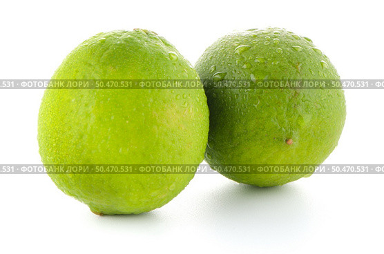 Fresh green limes isolated on white background. Стоковое фото, агентство Ingram Publishing / Фотобанк Лори