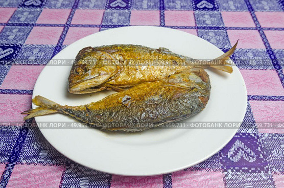 Fried fish cooked to taste. Стоковое фото, агентство Ingram Publishing / Фотобанк Лори