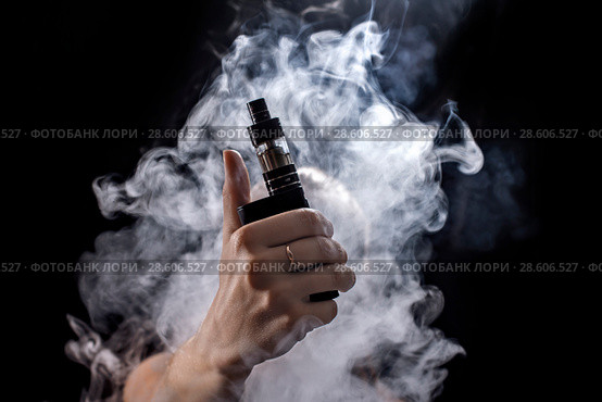 Girl soars on a black background vape. Стоковое фото, фотограф Светов Дмитрий Иванович / Фотобанк Лори